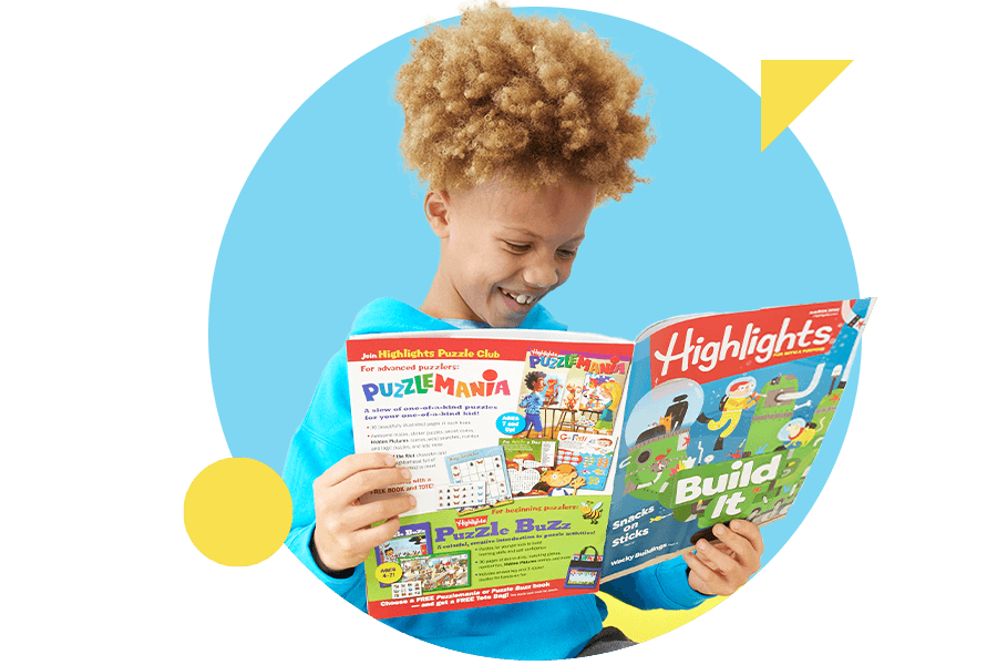 A child smiling and reading Highlights magazine.