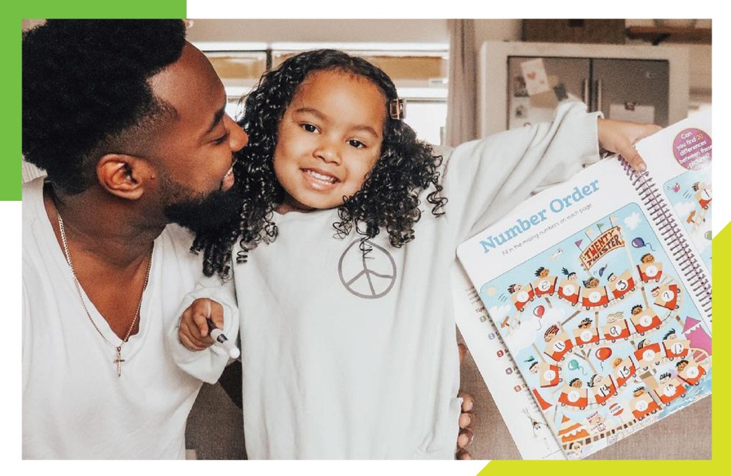 Father and Daughter enjoy Write-on, Wipe-off products from Highlights